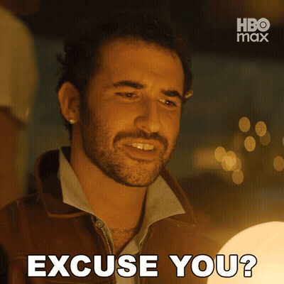 A Man With A Beard Says Excuse You In Front Of A Hbo Max Logo GIF