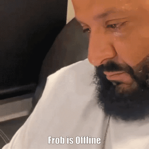A Man With A Beard Says Frob Is Offline In A White Shirt GIF