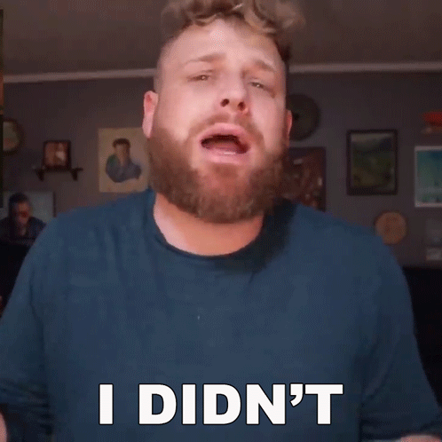 A Man With A Beard Says " I Didn 'T " GIF