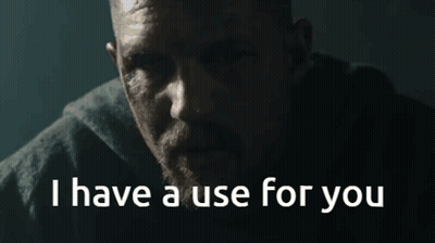 A Man With A Beard Says " I Have A Use For You " In A Dark Room GIF