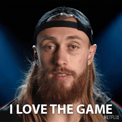 a man with a beard says i love the game