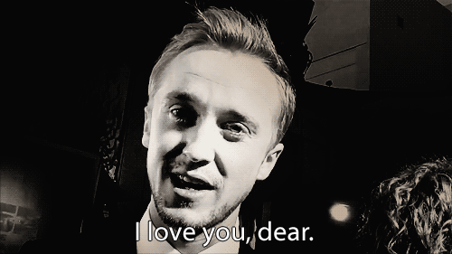 A Man With A Beard Says I Love You Dear In A Black And White Photo GIF