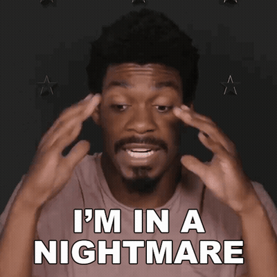 A Man With A Beard Says I 'M In A Nightmare With His Hands On His Head GIF