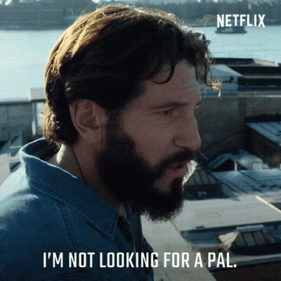 A Man With A Beard Says " I 'M Not Looking For A Pal " In A Netflix Ad GIF
