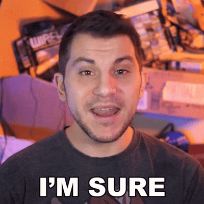 a man with a beard says i 'm sure in front of electronics