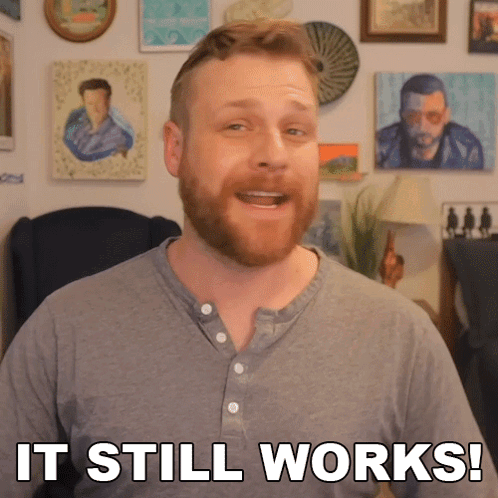 A Man With A Beard Says It Still Works In Front Of Paintings GIF