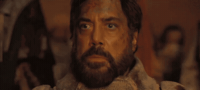 A Man With A Beard Says Lisan Al-Gaib In White Letters GIF