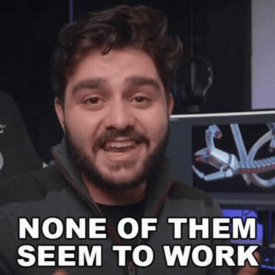 A Man With A Beard Says " None Of Them Seem To Work " In Front Of A Computer Monitor GIF