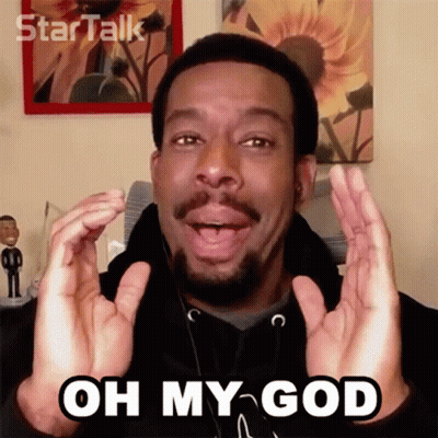 A Man With A Beard Says Oh My God With His Hands In The Air GIF
