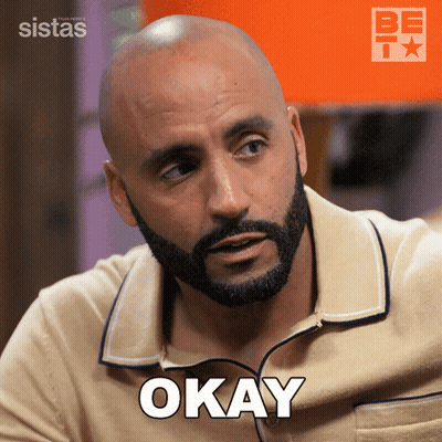 A Man With A Beard Says Okay In Front Of A Sistas Logo GIF