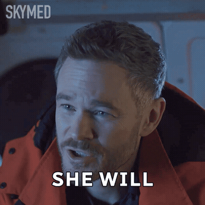 A Man With A Beard Says She Will In Front Of A Skymed Logo GIF