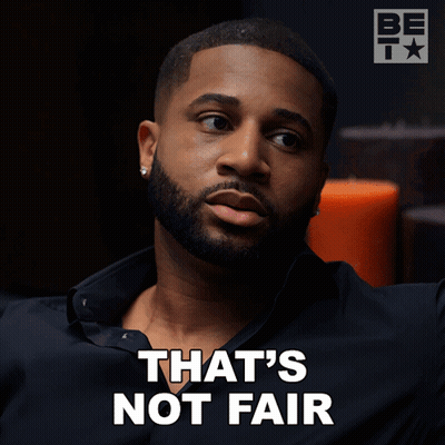A Man With A Beard Says " That 'S Not Fair " In White Letters GIF