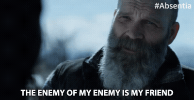 A Man With A Beard Says " The Enemy Of My Enemy Is My Friend " In A Video GIF