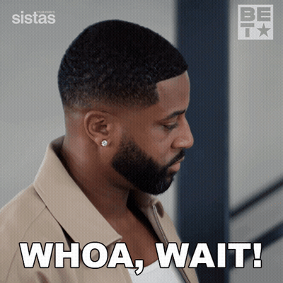 A Man With A Beard Says Whoa Wait In A Gif