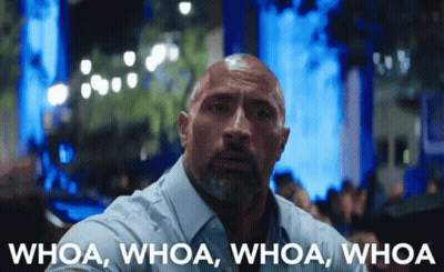 A Man With A Beard Says Whoa Whoa Whoa Whoa In Front Of A Blurry Background GIF
