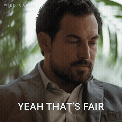 A Man With A Beard Says " Yeah That 'S Fair " While Looking Down GIF