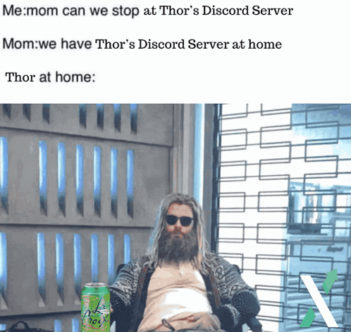 A Man With A Beard Sits In A Chair With A Can Of Soda In Front Of Him GIF