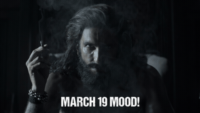 A Man With A Beard Smoking A Cigarette With The Words March 19 Mood GIF