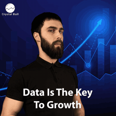 A Man With A Beard Stands In Front Of A Graph With The Words Data Is The Key To Growth GIF