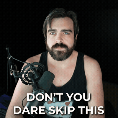 A Man With A Beard Stands In Front Of A Microphone With The Words " Do N't You Dare Skip This " GIF