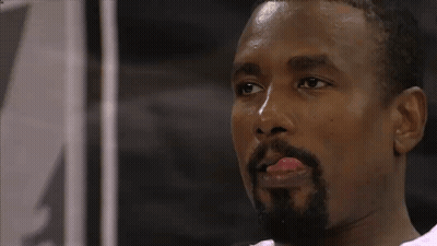 A Man With A Beard Sticks His Tongue Out GIF