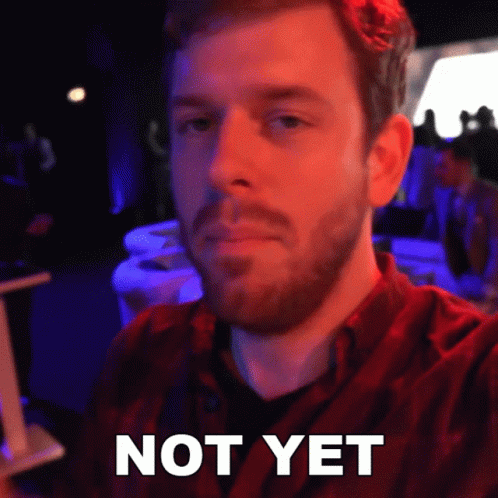 A Man With A Beard Takes A Selfie And Says " Not Yet " In White Letters GIF