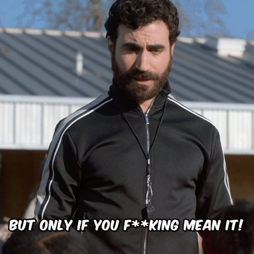 A Man With A Beard Wearing A Black Jacket Says But Only If You F * * King Mean It GIF