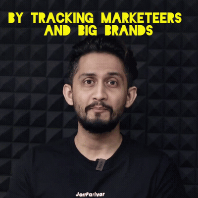 A Man With A Beard Wearing A Black Shirt That Says ' Jamparivar ' On It GIF