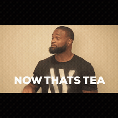 A Man With A Beard Wearing A Black Shirt That Says Now Thats Tea GIF