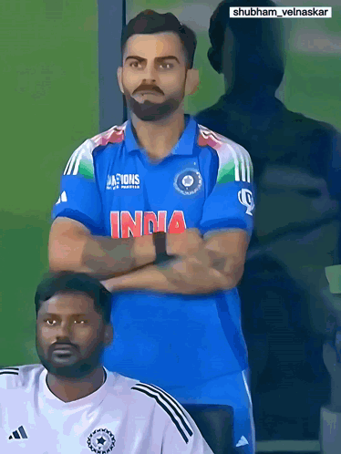 A Man With A Beard Wearing A Blue India Jersey GIF