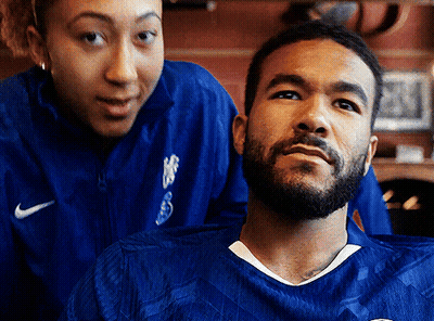 A Man With A Beard Wearing A Blue Nike Shirt GIF