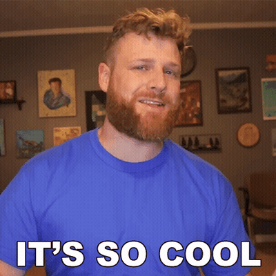 A Man With A Beard Wearing A Blue Shirt Says It 'S So Cool GIF