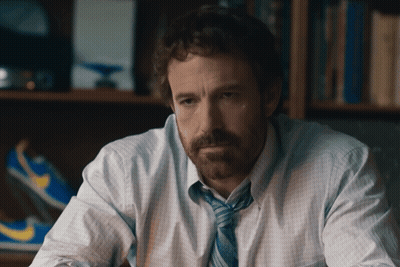 A Man With A Beard Wearing A Blue Tie GIF