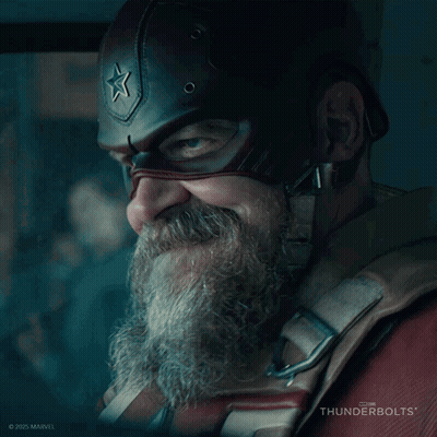 A Man With A Beard Wearing A Captain America Helmet With A Star On It GIF