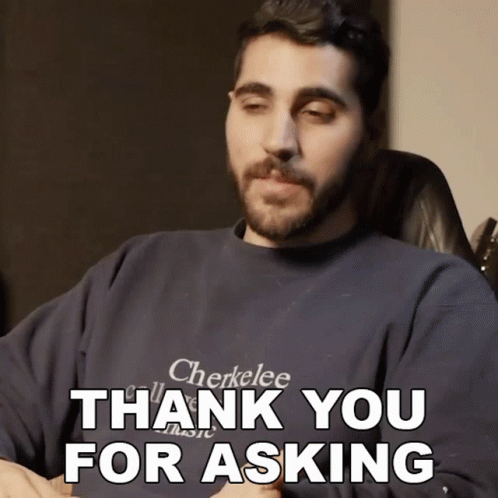 A Man With A Beard Wearing A Cherkelee Shirt Says " Thank You For Asking " GIF
