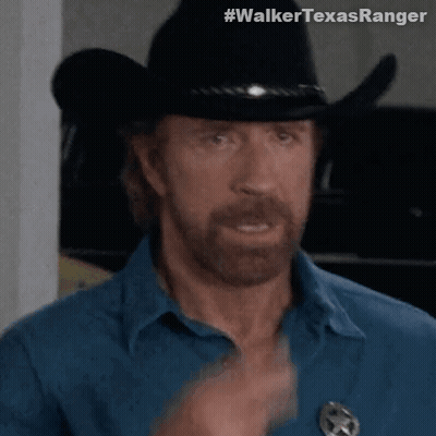 A Man With A Beard Wearing A Cowboy Hat And A Badge That Says Walker Texasranger GIF