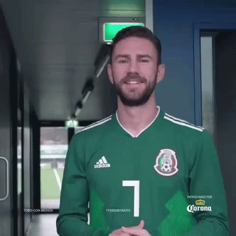 A Man With A Beard Wearing A Green Adidas Jersey With The Number 1 On It GIF