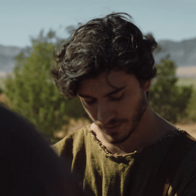 A Man With A Beard Wearing A Green Shirt GIF