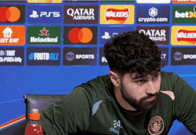 A Man With A Beard Wearing A Green Shirt With The Number 24 On The Front GIF