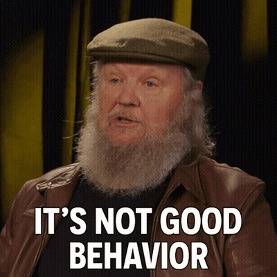 A Man With A Beard Wearing A Hat And A Brown Jacket Says It 'S Not Good Behavior GIF