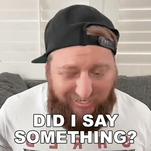 A Man With A Beard Wearing A Hat And A White Shirt Says " Did I Say Something " GIF