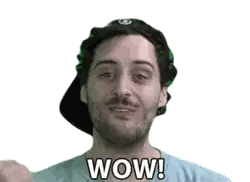 A Man With A Beard Wearing A Hat Is Laughing And Says Wow Sticker