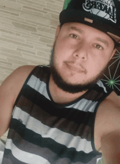 A Man With A Beard Wearing A Hat That Says ' Oakland ' On It GIF