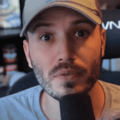 A Man With A Beard Wearing A Hat That Says Vn On It GIF