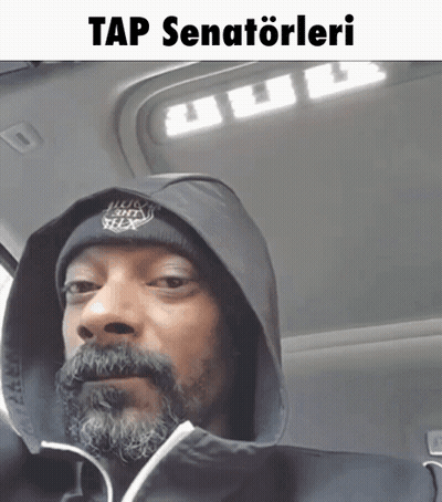 A Man With A Beard Wearing A Hooded Jacket And A Beanie Says Tap Senatoleri On The Bottom GIF