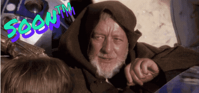 A Man With A Beard Wearing A Hooded Jacket With The Words Soon Tm On The Bottom GIF