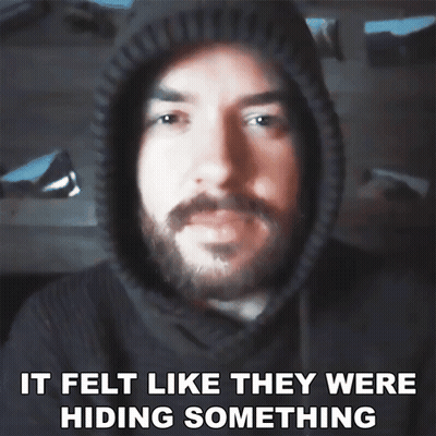 A Man With A Beard Wearing A Hoodie With The Words It Felt Like They Were Hiding Something GIF