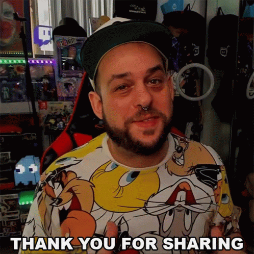 A Man With A Beard Wearing A Looney Tunes Shirt Says Thank You For Sharing GIF