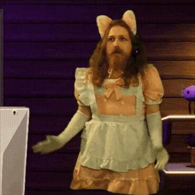 A Man With A Beard Wearing A Maid Costume GIF