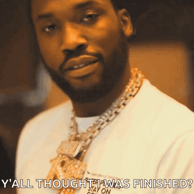 A Man With A Beard Wearing A Necklace And A White Shirt Says Y All Thought I Was Finished ? GIF